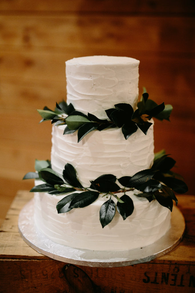 wedding cake, cake, tiered wedding cake, wedding cake with greenery, wedding planning, wedding planner, nashville wedding planner, brooklyn wedding planner, modern vintage events, trinity view farms, jo's custom cakes and catering, brad and jen photography, planning + prosecco